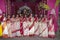 Bengali married women in sari playing sindoor khela, traditional Bengali ritual before immersion of Goddess durga. Selective focus