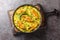 Bengali style Fish Pilaf cooked with Ilish Fish closeup on the black pan. Horizontal top view