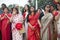 Bengali women watching immersion of Goddess Durga