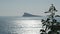 Benidorm Island distant waterside view. Spain