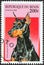 BENIN - CIRCA 1997: A stamp printed in Benin from the `Dogs` issue shows a Dobermann pinscher, circa 1997.