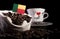 Benin flag in a bag with coffee beans isolated on black