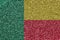 Benin flag depicted on many small shiny sequins. Colorful festival background for party