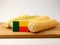 Benin flag on a wooden panel with corn isolated on a white backg