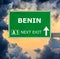 BENIN road sign against clear blue sky