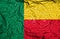 Benin vintage flag on old crumpled paper background