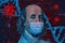 Benjamin Ben Franklin isolated face from 100 dollar banknote with a face mask on covid background