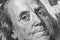 Benjamin Franklin face on us one hundred dollar bill macro isolated, united states money closeup