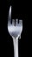 Bent metal fork, pointer.