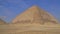 The Bent Pyramid is an ancient Egyptian pyramid located at the royal necropolis of Dahshur, Cairo