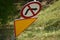 Bent road sign, bent post. traffic regulations. road safety