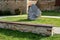 Bent sandstone walls made of stone blocks serve as design elements, retaining walls, or seating areas, seats for park visitors. be