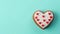 Bento cake with heart shaped heart pattern on turquoise background, Valentine\\\'s Day, free space for text