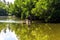 Bentota river with silhuette of fisherman at sunny day