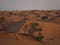 Berber walking in the desert