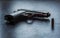 Beretta pistol with 9mm caliber bullet