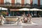 Bergamo, Italy - August 18, 2017: An unknown girl is drinking water from a source fountain.