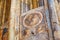 BERGAMO, ITALY - MAY 22, 2019: Ancient frescoes on the outside wall of the building of the Basilica di Santa Maria Maggiore Saint