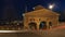 Bergamo, the old city. Landscape on the old gate named San Giacomo door during the evening with trails of headlights