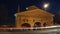 Bergamo, the old city. Landscape on the old gate named San Giacomo door during the evening with trails of headlights