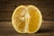 Bergamot oranges color yellow on pink wood