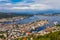 Bergen City, Scenic Aerial View Panorama harbour Cityscape under Dramatic Sky at sunset summer from Top of Mount Floyen