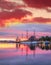 Bergen harbor with boats against colorful sunset in Norway, UNESCO World Heritage Site