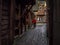 Bergen, Norway - March 2017: Man walking inside the bryggen hist