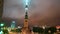 Berlin Alexanderplatz TV Tower and St. Mary`s Church in front, Foggy weather and clouds passing by, Time Lapse of City