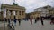 Berlin,famous pariser square mood,people walking,kids,police and brandeburg gate