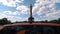 Berlin, German - April 26, 2020, Hyperlapse of the famous Victory Column SiegessÃ¤ule against blue sky in sunny day with traffic