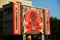 BERLIN, GERMANY: Drawing of a red rose on the wall.. Beautiful graffiti on a building in the German capital. Berlin, Germany