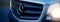 Berlin, Germany - January 29, 2020: Passenger van Mercedes-Benz Sprinter. Front grill, logo and headlights.