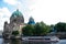 Berlin, Germany - July 21, 2019: protestant church seen from river. Cathedral or dom. Religious building. Baroque