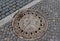 Berlin, Germany - June 2019: Manhole And Cobblestone