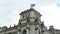 Berlin, Germany - May 24, 2017: German flags fluttering in the wind in back side of Reichstagin in moody day