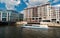 Berlin, Germany - May 31, 2017: pleasure boat on Spree river. Holiday cruiser ship on cityscape on cloudy sky. River