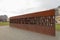 Berlin wall victims monument winter cloudy sky