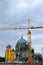 Berliner cathedral and construction cranes