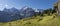 Bernese Alps with the Jungfrau, Monch and Eiger peaks over the alpine meadows