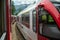 Bernina express on Switzerland. It is landmark of Swiss Alps. Nice Alpine landscape in summer. Red glacier train on