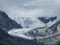 The Bernina glaciers during the summer time. View of the glaciers from Lake White. Slowly retreating glaciers on the Alps