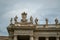 Bernini`s Saints Statues atop of St. Peter`s Square Colonnade, Vatican, Italy