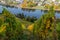 Bernkastel-Kues and the river Moselle in autumn with multi colored vineyard in the foreground