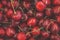 Berries background texture of juicy red cherry and cherries berry on market closeup