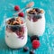 Berries, flakes and fresh yogurt in a jar