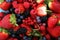 Berries overhead closeup colorful assorted mix of strawberry, bl