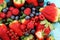 Berries overhead closeup colorful assorted mix of strawberry, bl