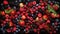 Berries overhead closeup colorful large assorted mix of strawbwerry, blueberry, raspberry, blackberry, red curant on dark