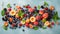 Berries overhead closeup colorful large assorted mix of strawbwerry, blueberry, raspberry, blackberry, red curant on dark